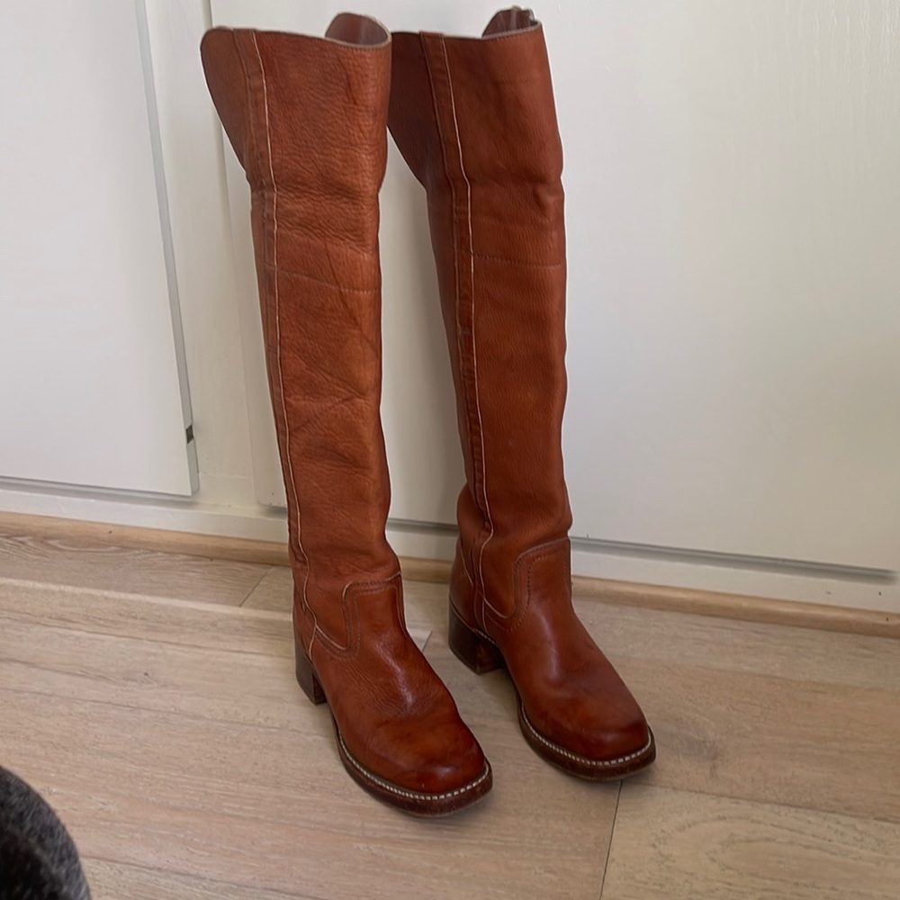 FRYE rust leather over-the-knee boots.